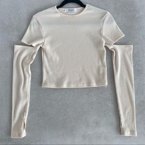 STORETS CUT OUT TOP WITH THUMB OPENINGS